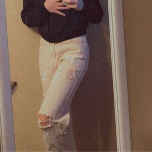 Cream Ripped Jeans with Butterfly Patterns